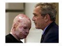 Mr. Bush bu askerin yüzü senin eserin, iyi bak!