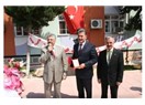 Mersin'in Toroslar İlçe Belediye Başkanı Tuna'ya Eğitim plaketi...