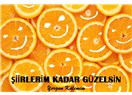 Şiirlerim kadar güzelsin