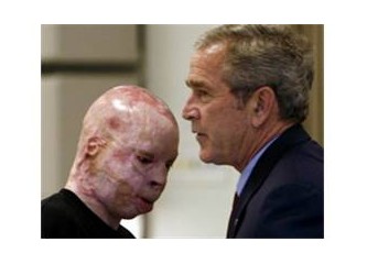Mr. Bush bu askerin yüzü senin eserin, iyi bak!