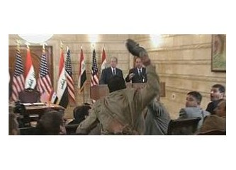 George W. Bush'a ayakkabılı veda öpücüğü