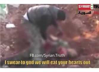 Suriye muhalif askeri Esad'ın askerinin kalbini kesip yiyor. Vahşetin nedenleri